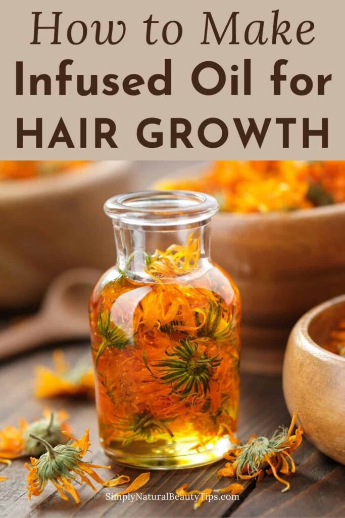 glass bottle with fresh calendula showing how to infuse herbs in oil for hair growth